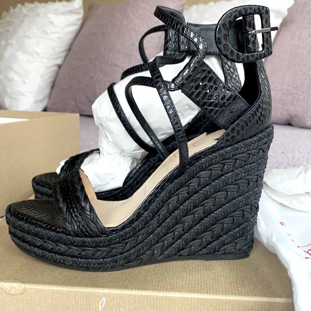 Louboutin wedge sandal size 38. Worn one time for a couple hours.
